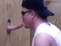 Guy blows dick through hole