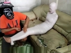 Mummified Girl on a Couch