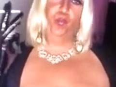 Chrissie smoking a 120 with black pvc gloves on