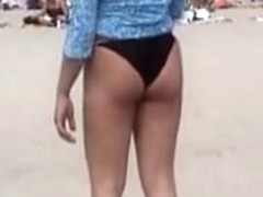 Candid beach babe is playing volley ball in bikini 04w