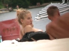 Blonde model on the nude beach voyeur video