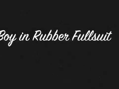 Fellow in rubber fullsuit