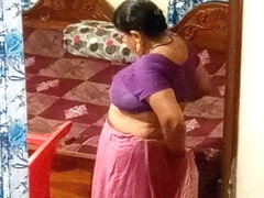 Aunty caught red handed on camera while changing dress.