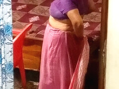 Aunty caught red handed on camera while changing dress.