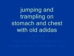 trampling...jumping and trampling on stomach and chest with