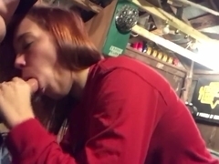 Sexy girl gives blowjob in the garage